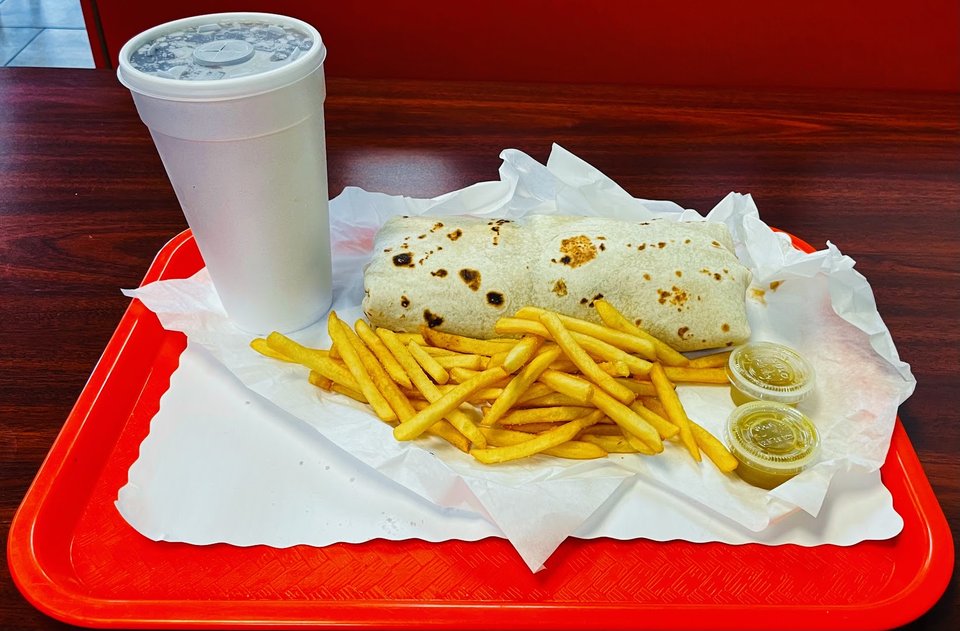 Fresh burritos served in a bright setting.